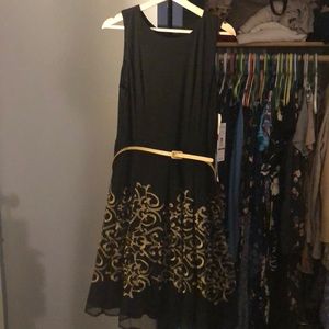 Black and gold cocktail dress with belt